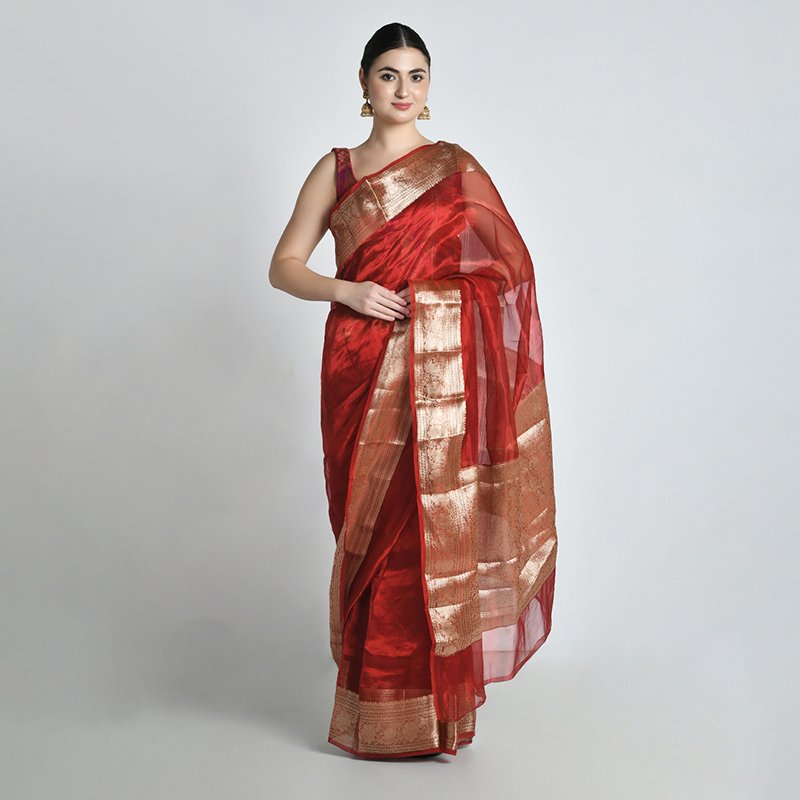 Female model in maroon zari border saree right angle pose studio photoshoot | Lohar Studio